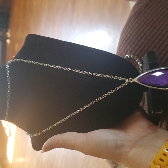 This a long necklace with a very pretty purple stone - Picture 2 of 3